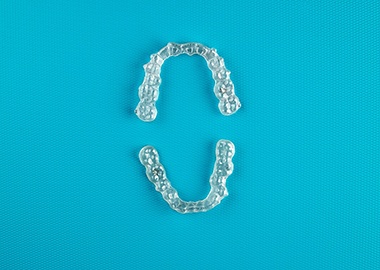 Invisalign aligners on a counter top