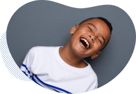 Child laughing with healthy smile after dental checkup