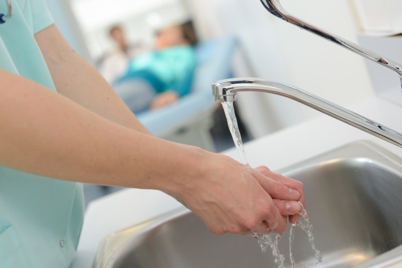 Emergency dentist in Granby, CT washing hands