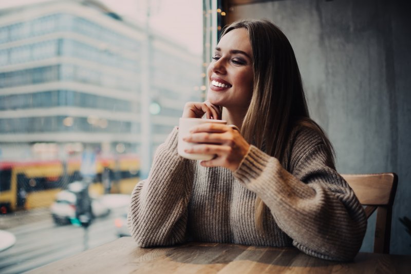 woman enjoying diet change with veneers in Granby