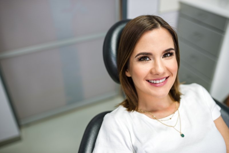 person who had root canal therapy smiling 